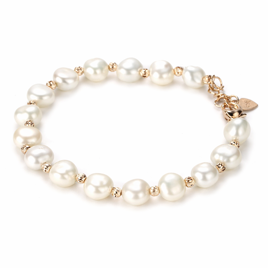 Pearl bracelet with gold accents on a white background
