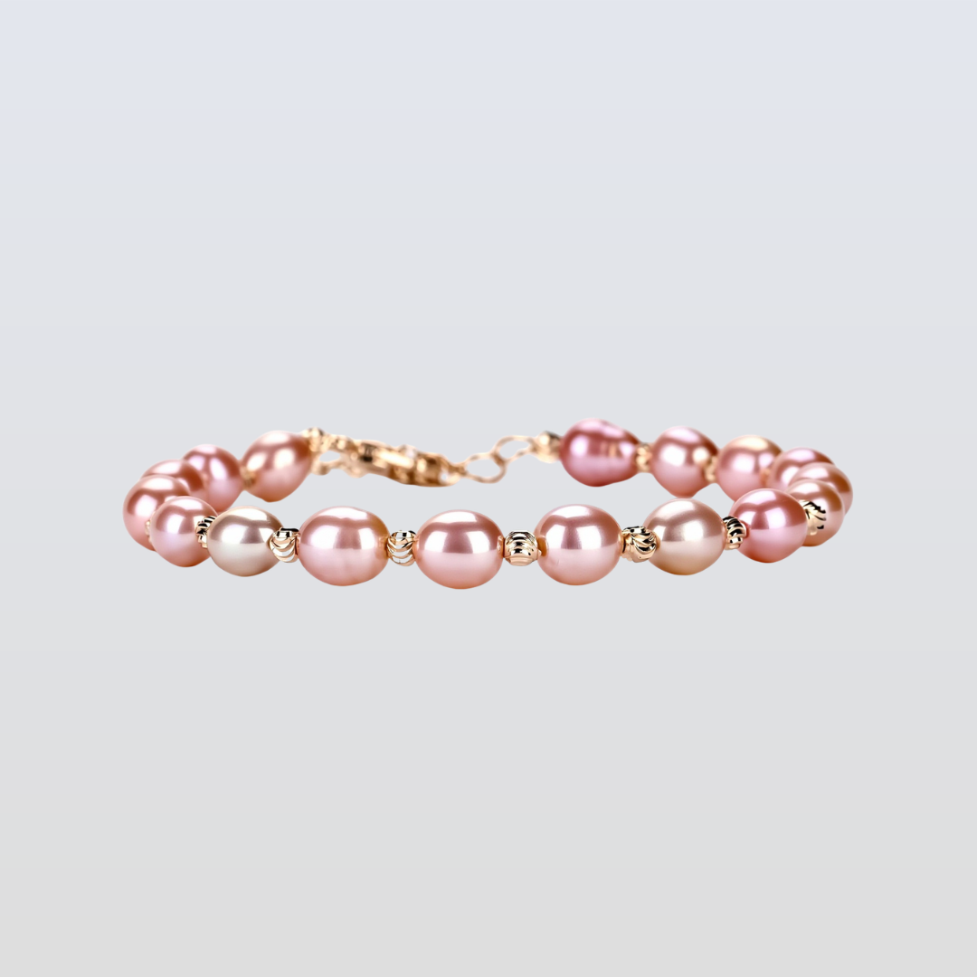 Pink pearl bracelet on a light gray background