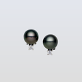 Pair of black pearl earrings with diamond accents on a light gray background