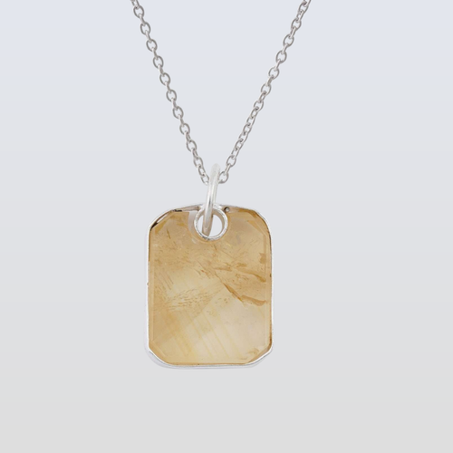 Necklace with a rectangular pendant on a light gray background