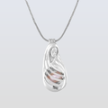 Silver pendant necklace on a light gray background