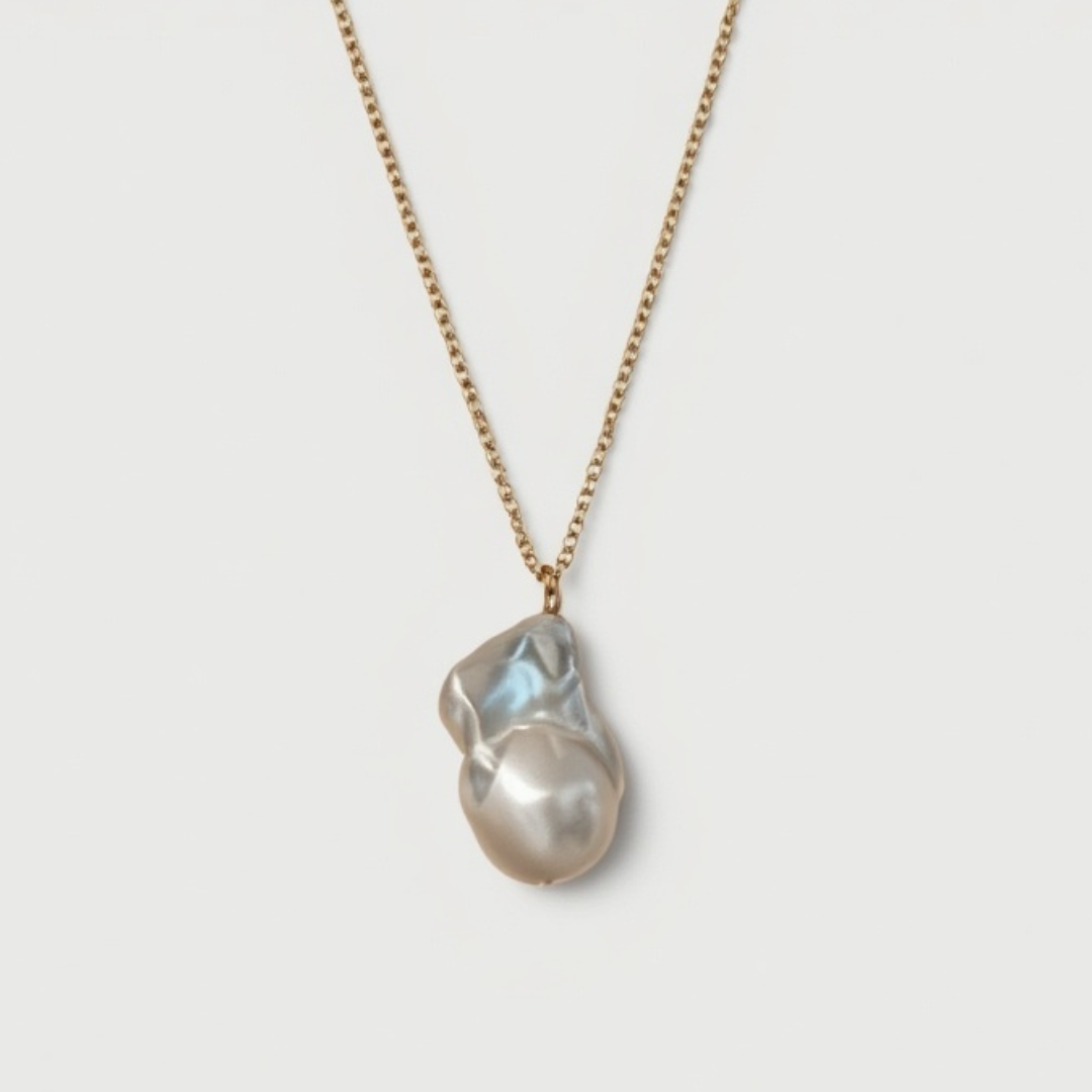 Pearl necklace on a light gray background