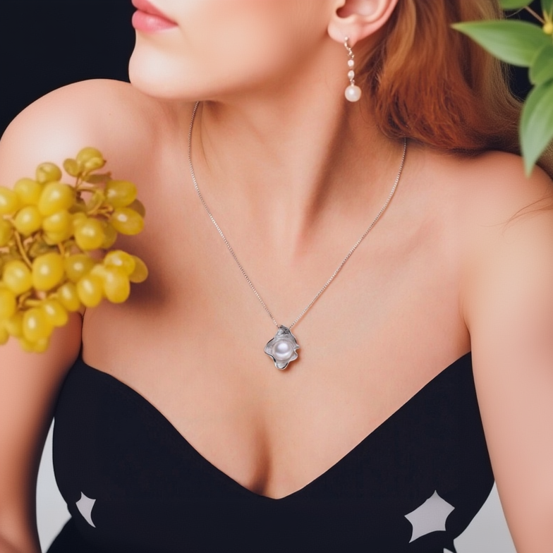 Pearl necklace worn by a person with a blurred background