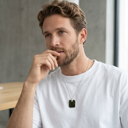 man wearing pendant