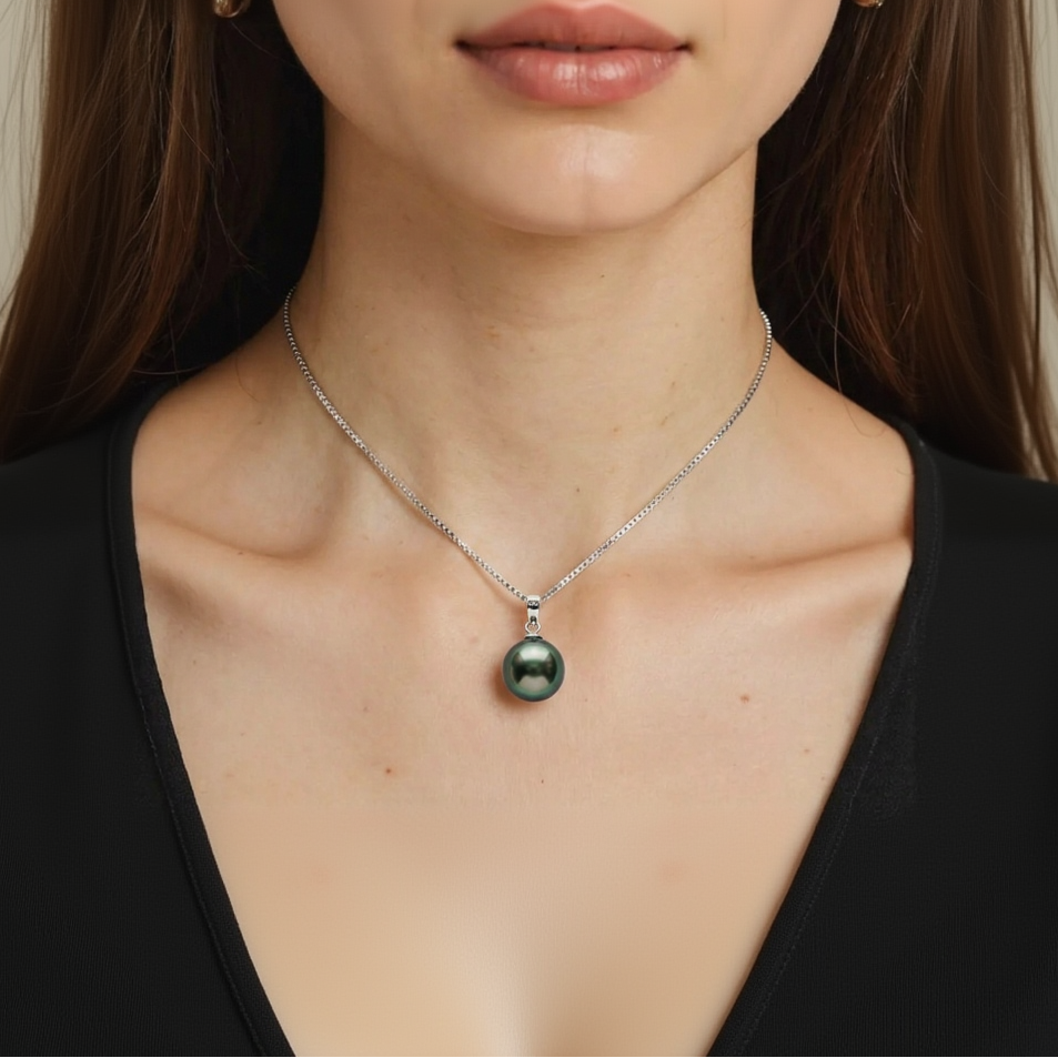 Necklace with a pendant worn by a person