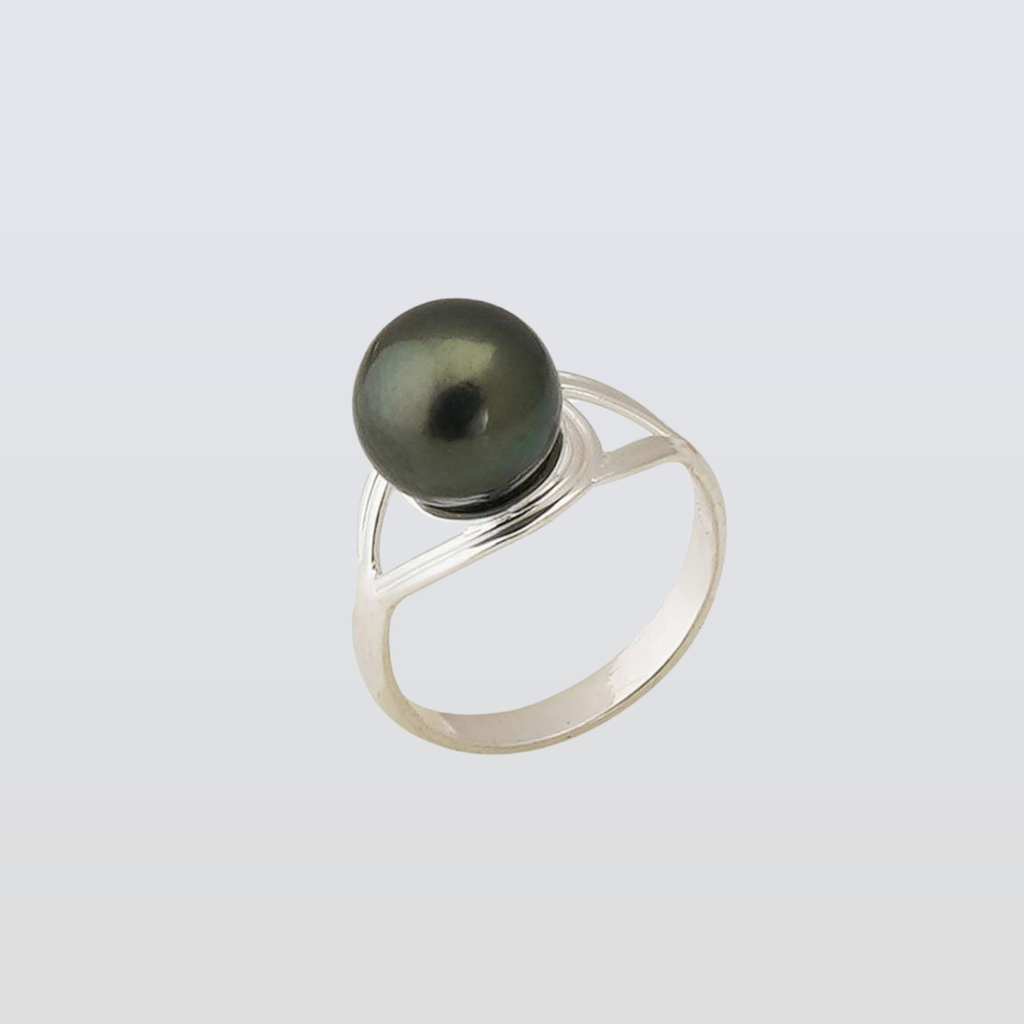 Silver ring with a black pearl on a light gray background