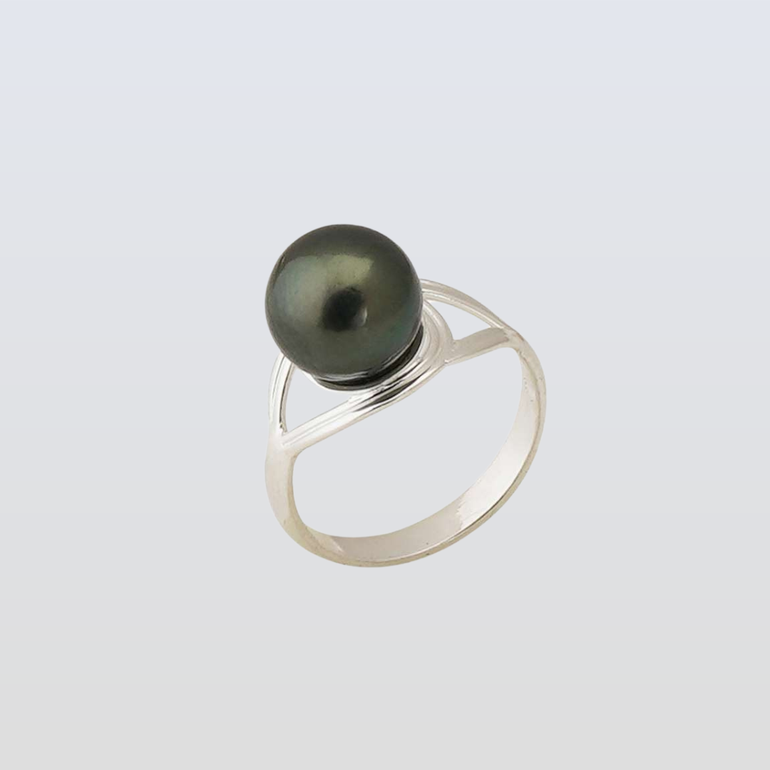 Silver ring with a black pearl on a light gray background