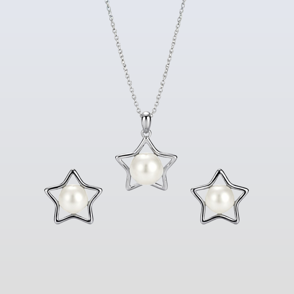 Star-shaped pearl jewelry set on a light gray background