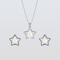 Star-shaped pearl jewelry set on a light gray background