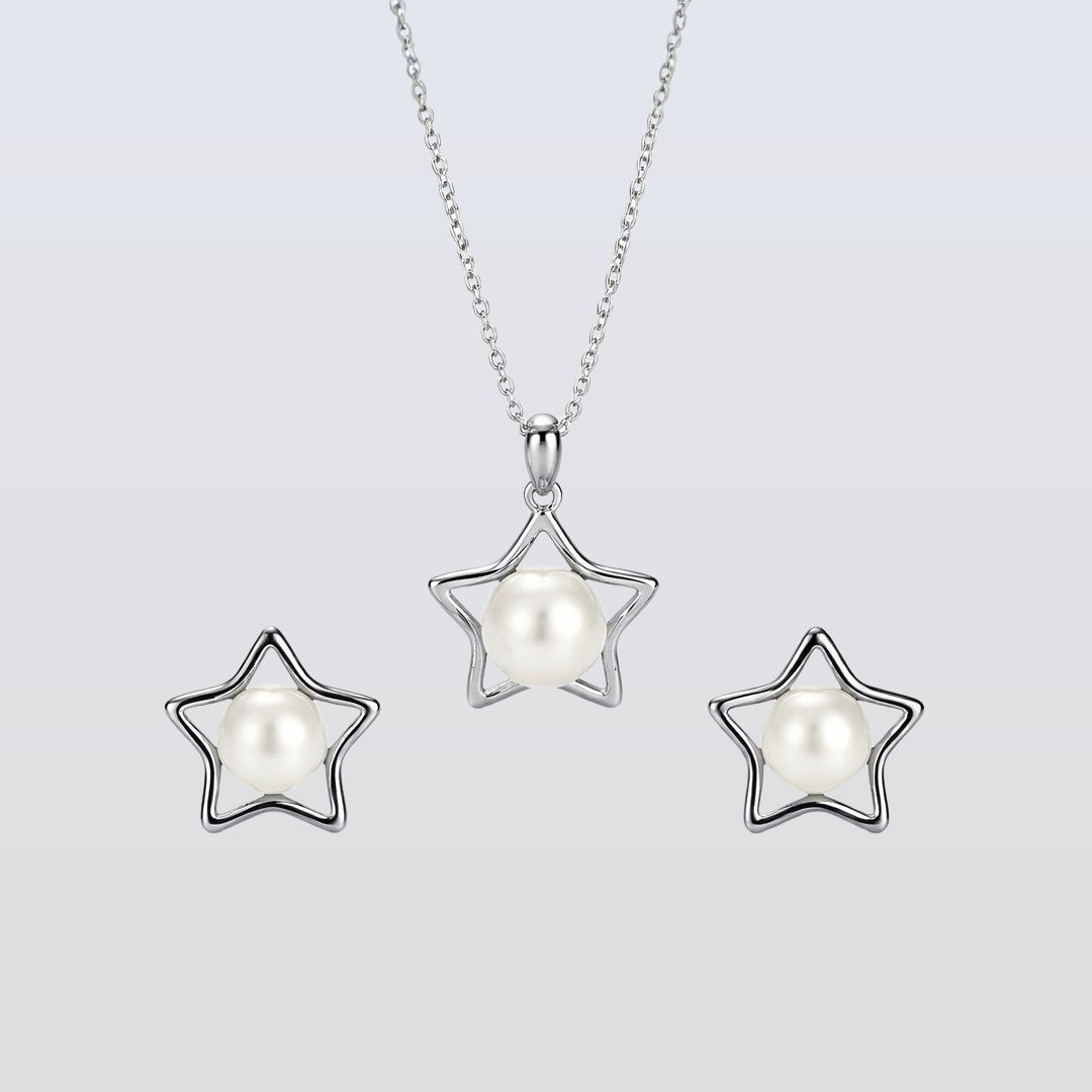 Star-shaped pearl jewelry set on a light gray background