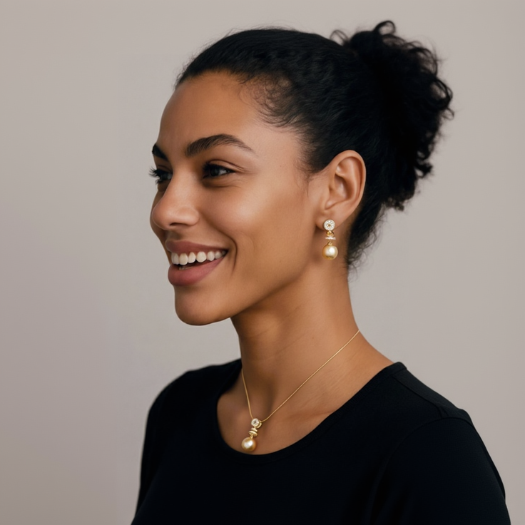 Woman wearing pearl earrings with a neutral background
